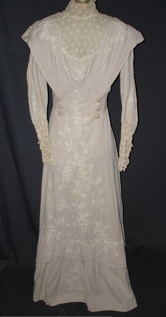 Victorian summer day dress, c. 1900. White cotton with floral embroidery. Ivory lace on sleeves and neckline were added at later date.