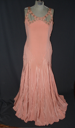 Eally 1940s evening gown. Peach silk with rhinestone embellishments on straps